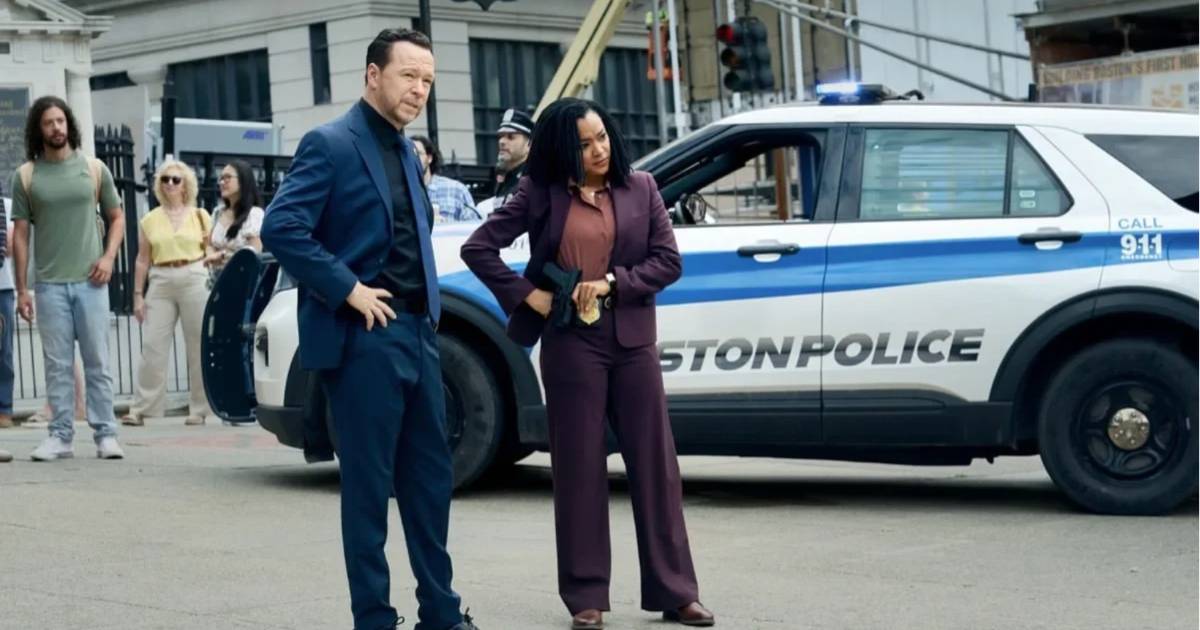 Danny Reagan and Lena Silver beside a police vehicle in 'Boston Blue' (Cover Image source: CBS)