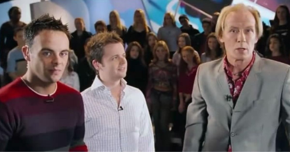 Declan Donnelly, Anthony McPartlin, and Bill Nighy in a still from 'Love Actually' (Cover Image Source: Universal Pictures)