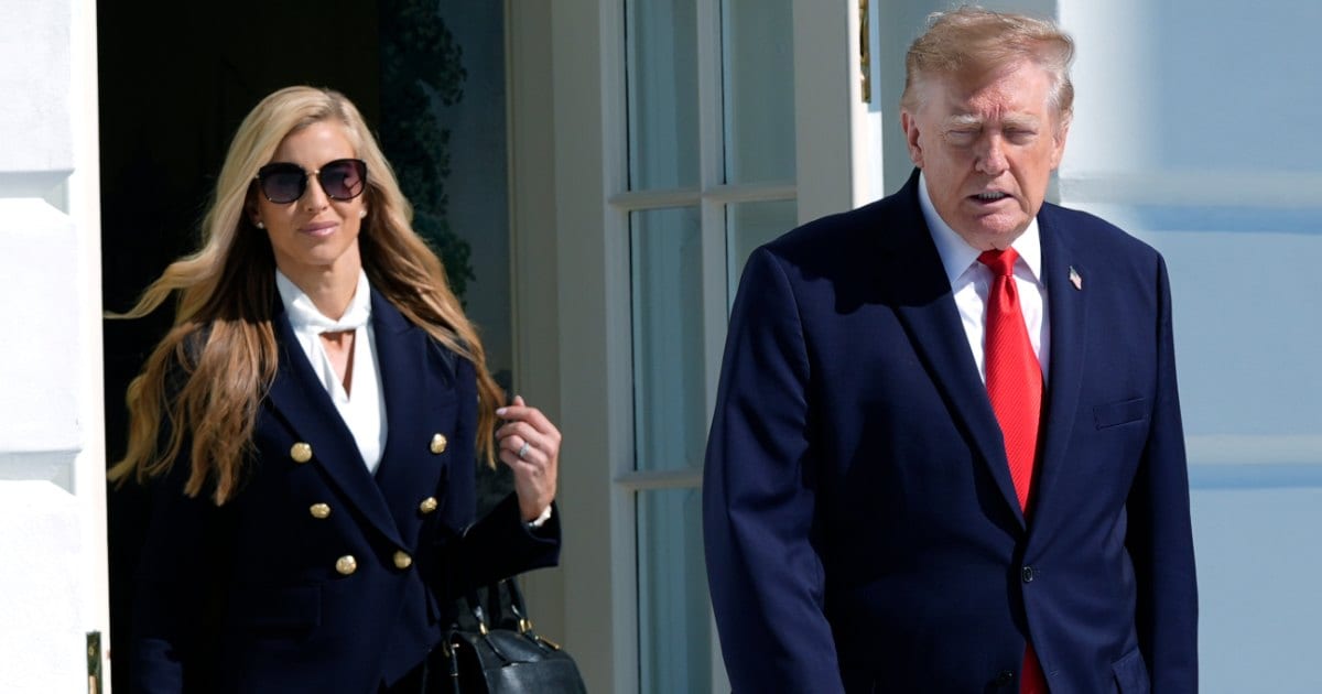 President Trump walks out along with Katie Zacharia to talk to reporters on the South Lawn of the White House, Tuesday, Oct. 13, 2026 (AP Photo)