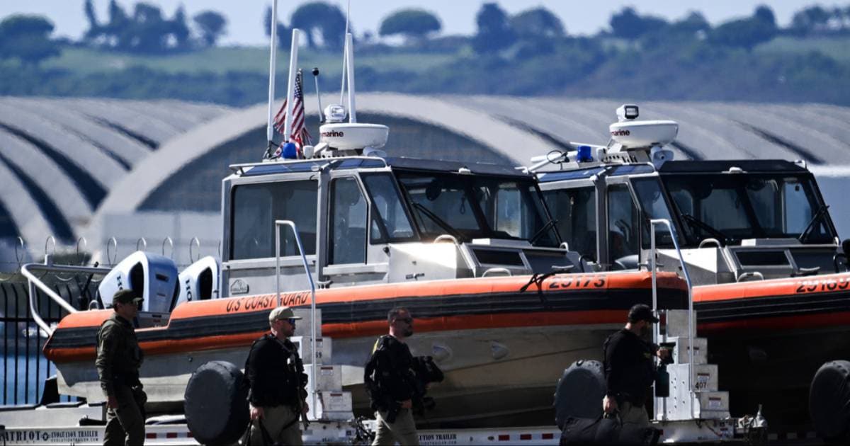 U.S. Coast Guard and Navy crews continued searching off Baja California for 11 people after a boat capsized (AP Photo)