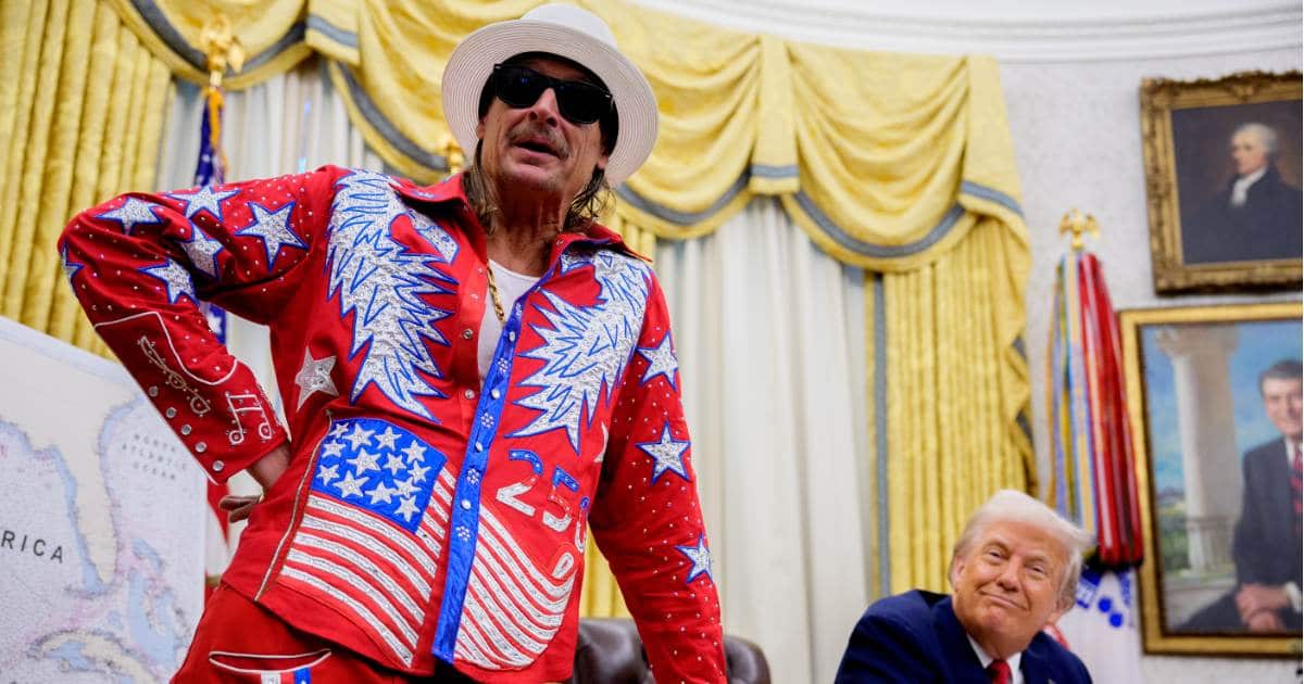 President Donald Trump listens as entertainer Kid Rock speaks during an executive order signing event in the Oval Office of the White House on March 31, 2025, in Washington, DC (Andrew Harnik/Getty Images)