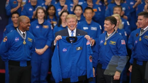 President Donald Trump participates in a Congressional Space Medal of Honor ceremony at NASA's Johnson Space Center, Friday, Aug. 28, 2026, in Houston, with Artemis II Astronauts from left, Pilot Victor Glover, Commander Reid Wiseman and Mission Specialist Jeremy Hansen. (AP Photo/Karen Warren)