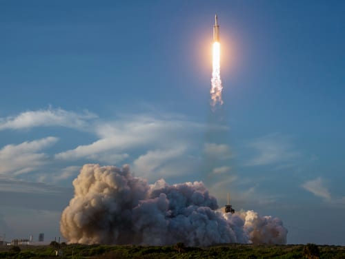 A SpaceX Falcon Heavy rocket launches with NASA’S Nancy Grace Roman Space Telescope onboard from Launch Complex 39A, Sunday, Aug. 30, 2026, at NASA’s Kennedy Space Center in Florida. Roman will investigate dark energy and dark matter, conduct a statistical census of planetary systems, and enable a broad range of additional astrophysics research. Launch occurred at 7:26 a.m. EDT. Photo Credit (NASA/Joel Kowsky)