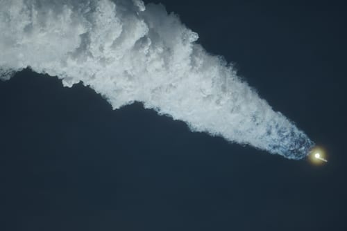 SpaceX's Starship leaves behind a plume as it rises towards space. (Image Source: AP Photo | Eric Gay)
