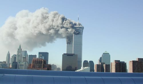 394261 04: Smoke pours from the World Trade Center after being hit by two planes September 11, 2001 in New York City. (Photo by Fabina Sbina/ Hugh Zareasky/Getty Images)
