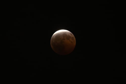 A partial lunar eclipse is seen in Los Angeles, Thursday, Aug. 27, 2026. (AP Photo/Jae C. Hong)