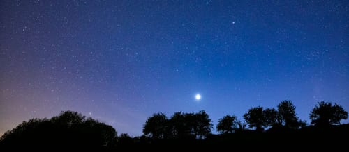 THE COTSWOLDS, UNITED KINGDOM: Multitude of stars and a shooting star in night sky with Venus at its brightest stage this year in prominent view over southern England, United Kingdom.  (Photo by Tim Graham/Getty Images)