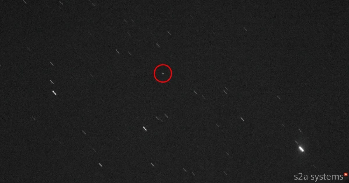 The JUICE spacecraft (encircled in red) captured during its Earth flyby on September 28, 2026. (Cover Image Source: s2a systems)