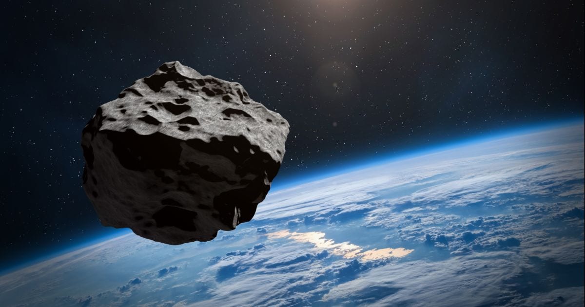 Planet Earth and big asteroid in the space. (Representative Cover Image Source: buradaki/Getty Images)