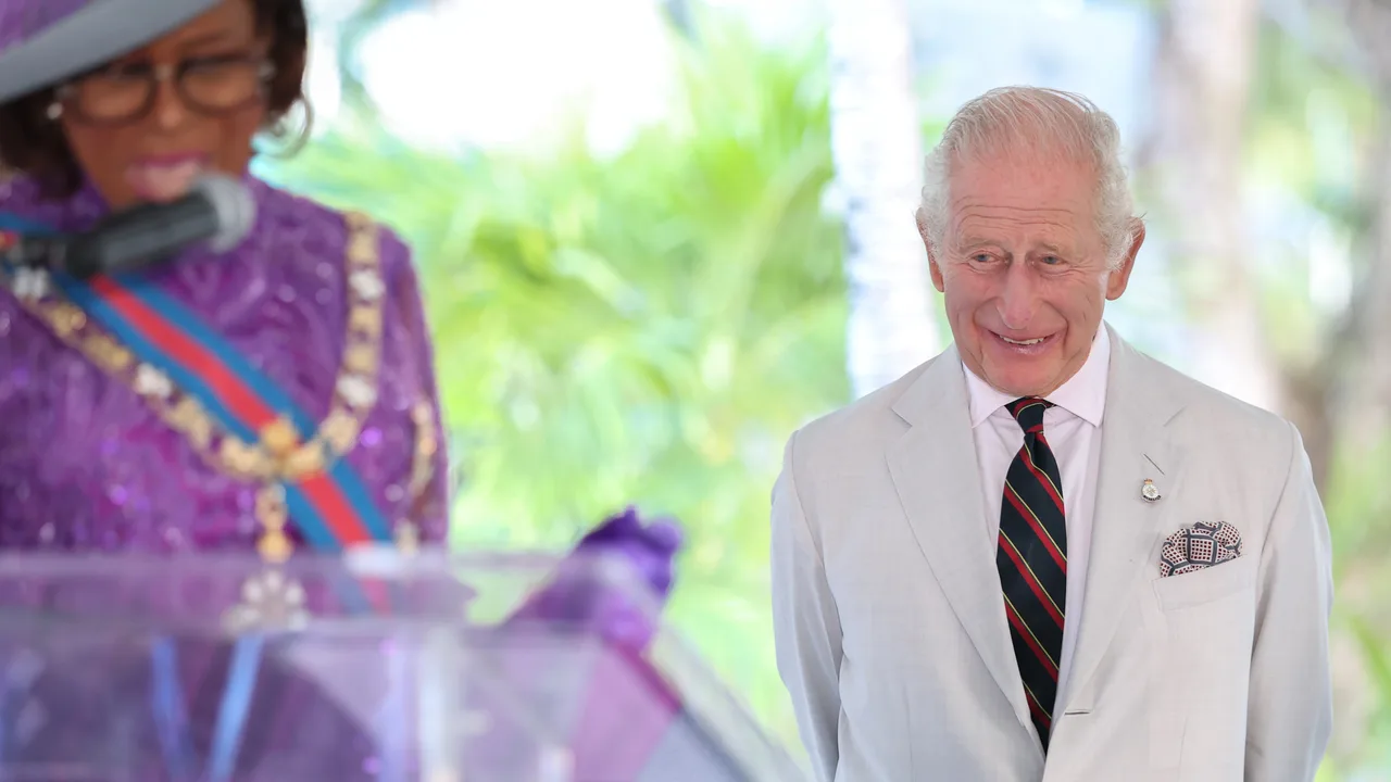 King Charles III smiles as he listens to the welcome speech by Governor-General, Dame Cynthia Pratt as he attends a Garden Reception at Government House during his visit to The Bahamas on October 28, 2026 in Nassau, Bahamas. (Cover Image Source: Getty Images | Chris Jackson)
