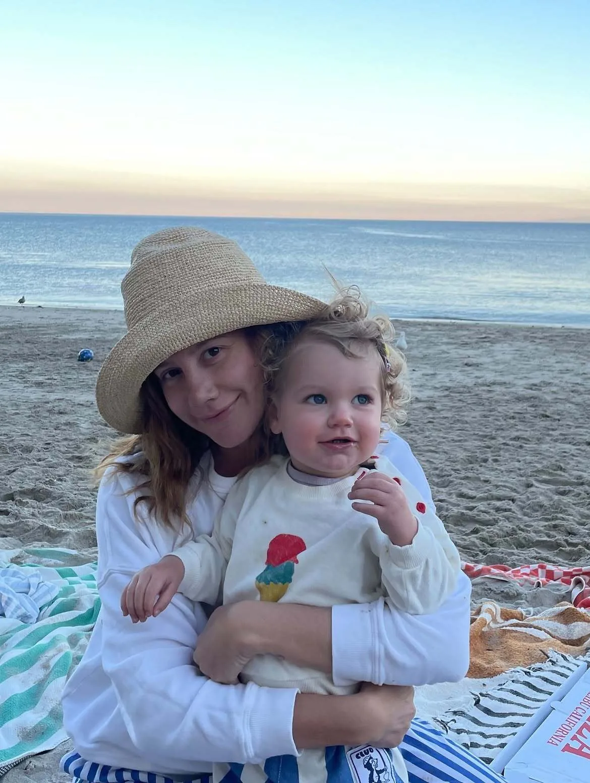 Ashley Tisdale and Emerson enjoy happy family time on a beach