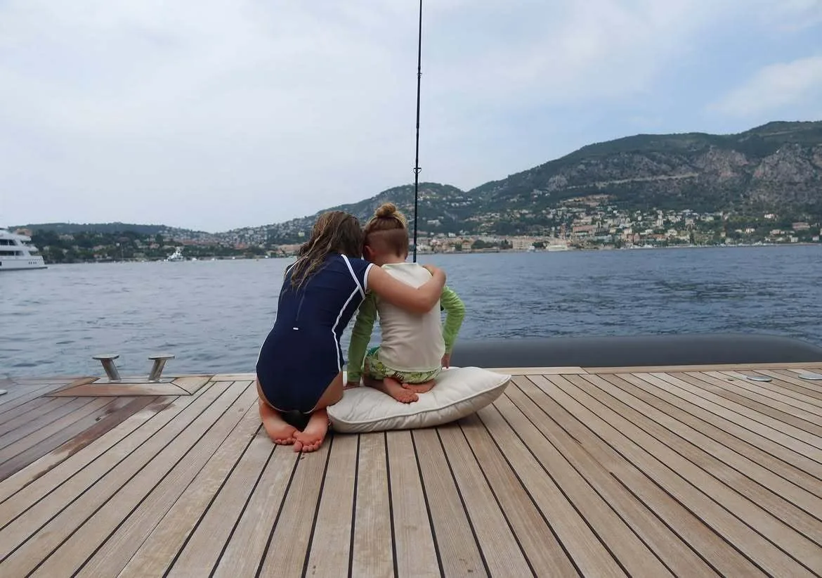 Behati Prinsloo’s children enjoy peaceful summer by the deck