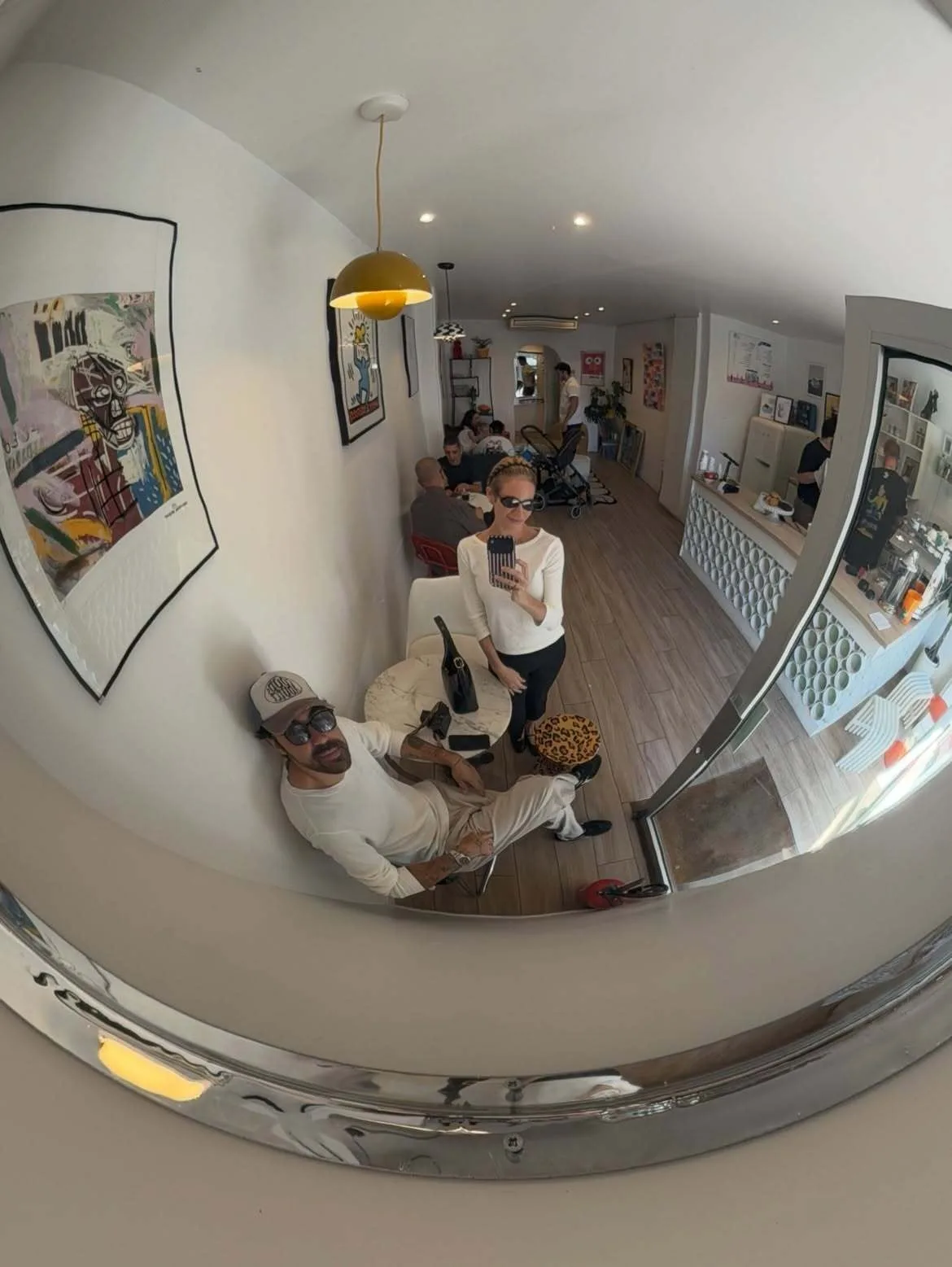 Brittany Snow and Hunter Moreno pose for fish-eye photo