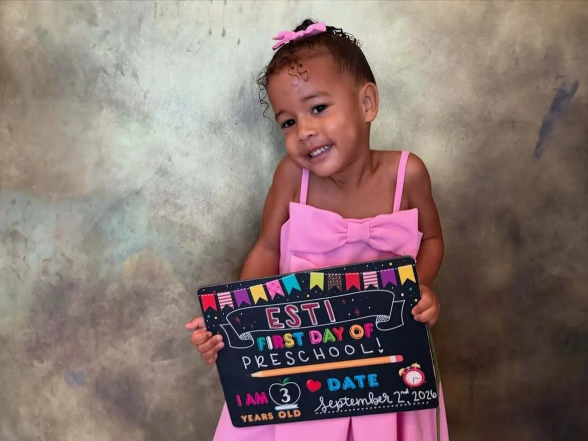 Esti, 3, cutely poses for camera