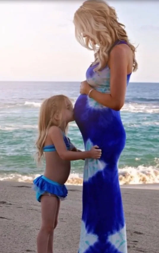 Taylor kisses Christina Haack's baby bump in adorable photo