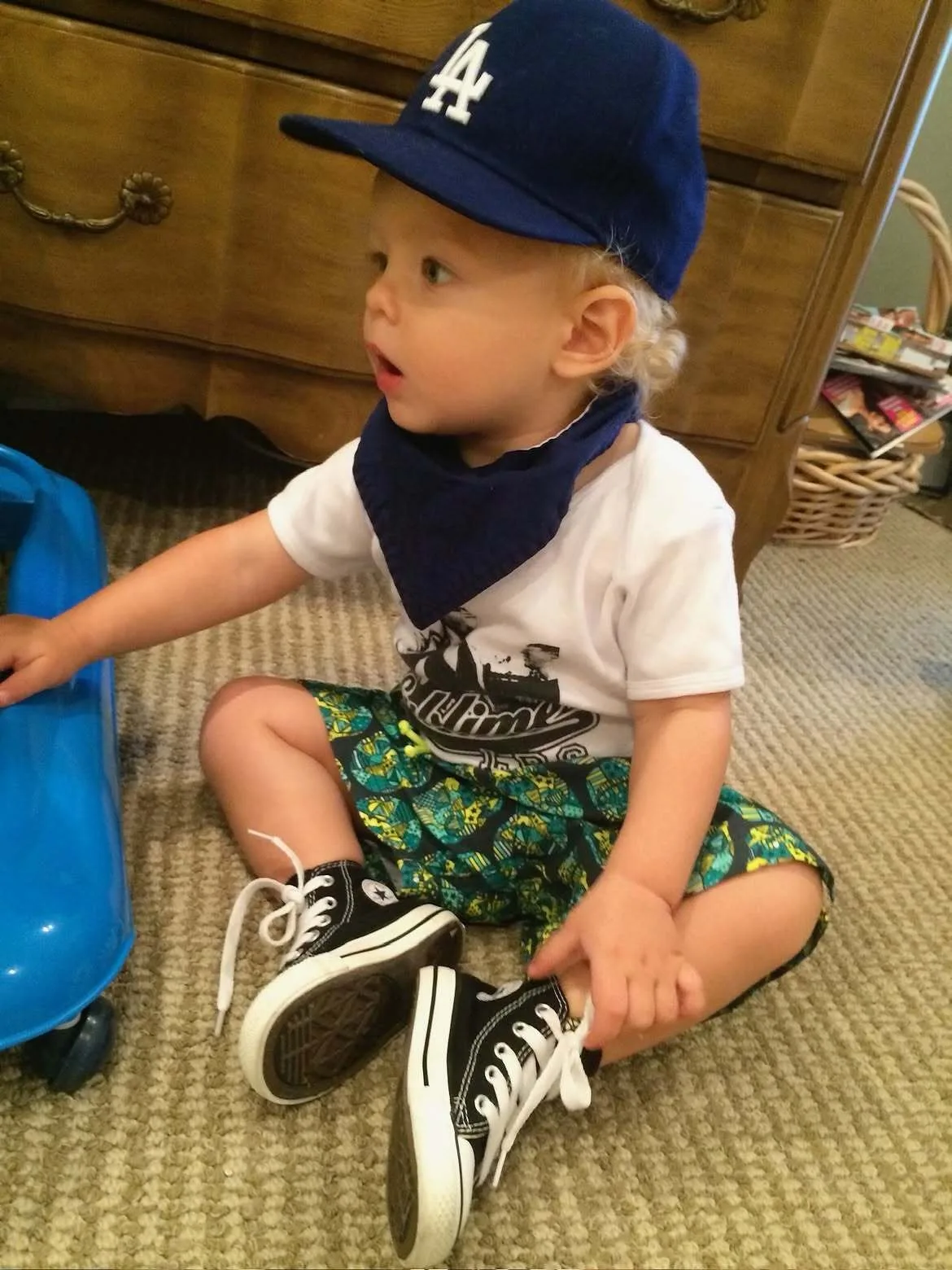 Little Axl Jack Duhamel looks cool in cap and sneakers