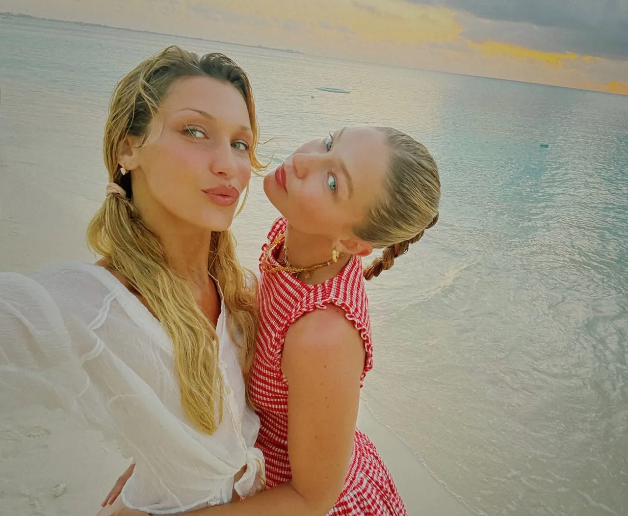 Gigi and Bella Hadid smile for a beachside selfie