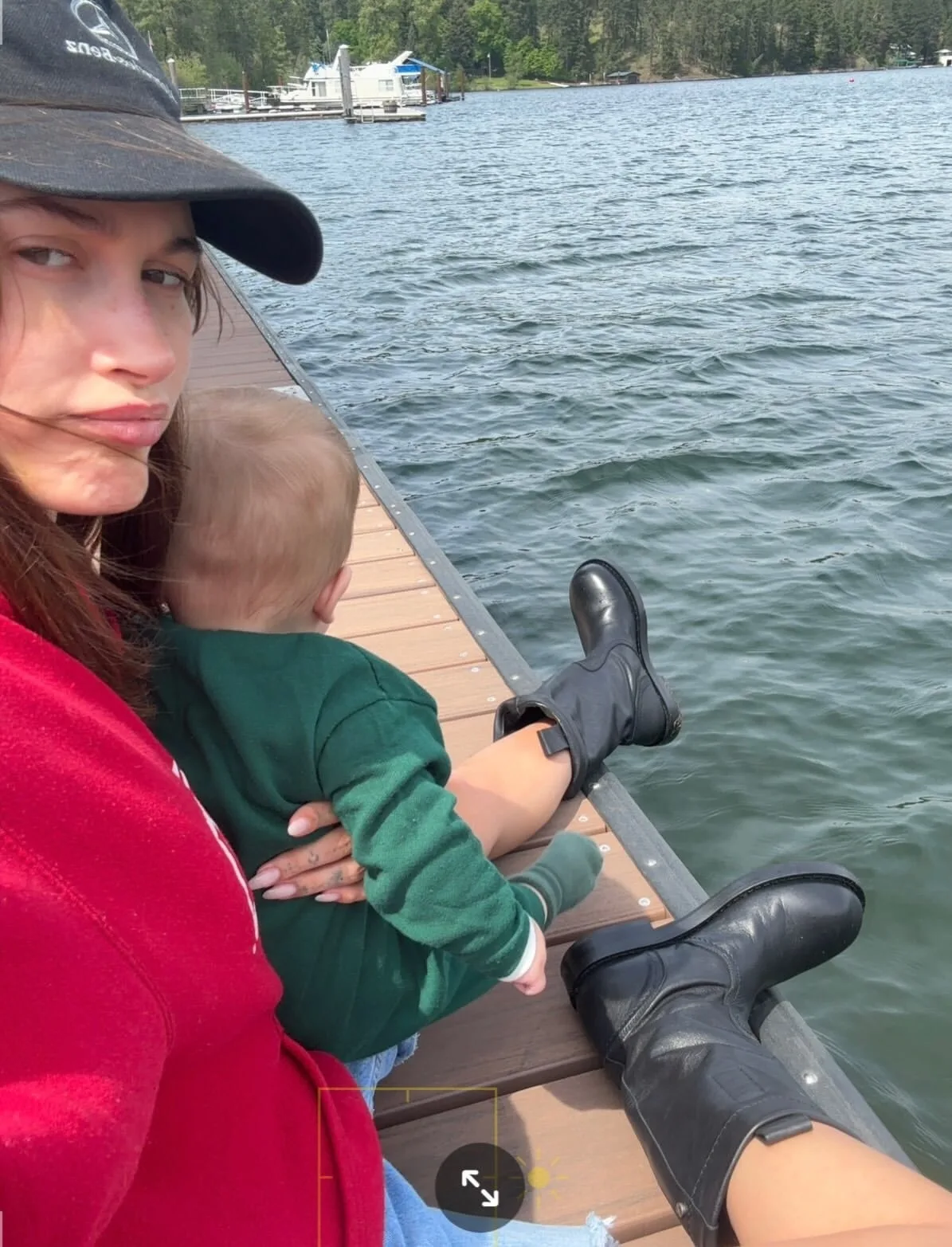 Hailey Bieber and Jack Blues enjoy a quiet moment by the river