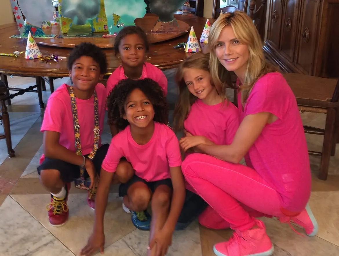 Heidi Klum and her kids match in fuchsia pink outfits