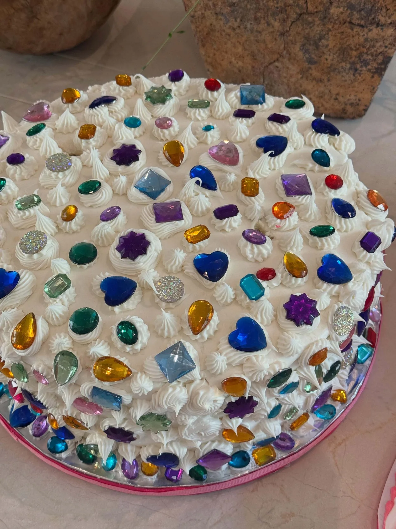 Kylie Jenner’s birthday cake shines with playful gemstones