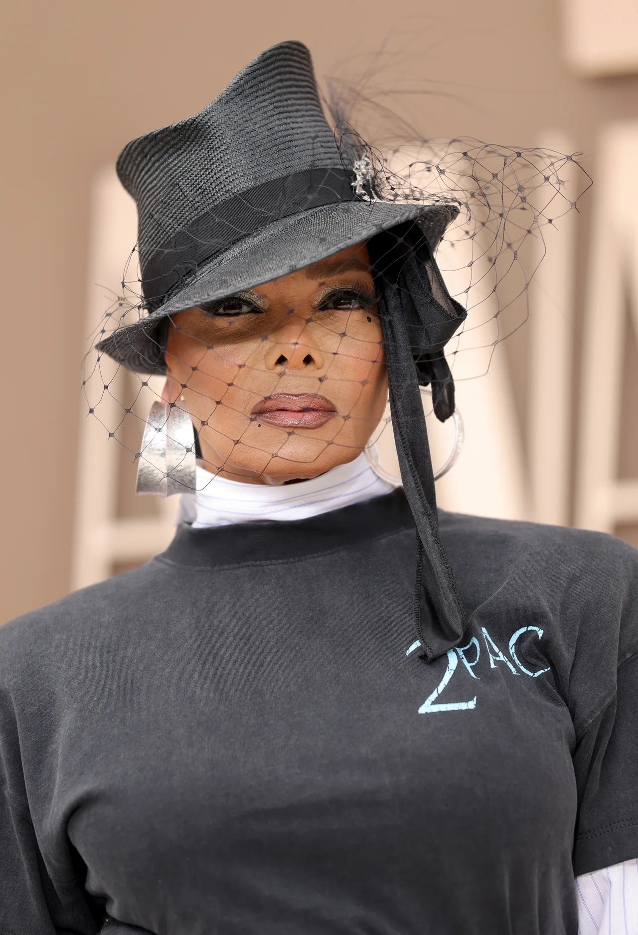 Janet Jackson pays homage to Tupac Shakur through her sartorial choice