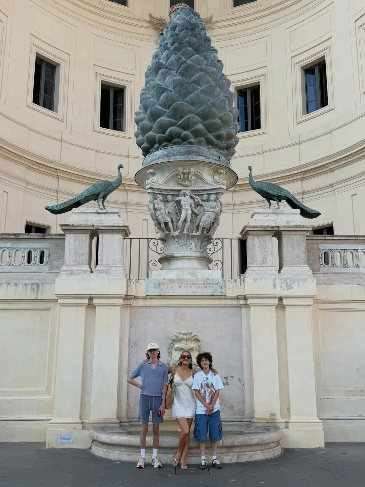 Jennifer Lopez poses with her twins in front of the Pigna