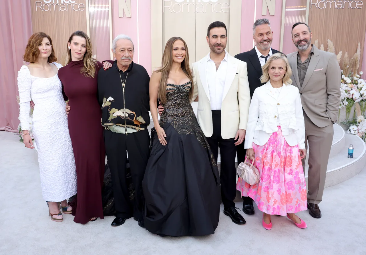 Jennifer Lopez poses with the cast of 'Office Romance'