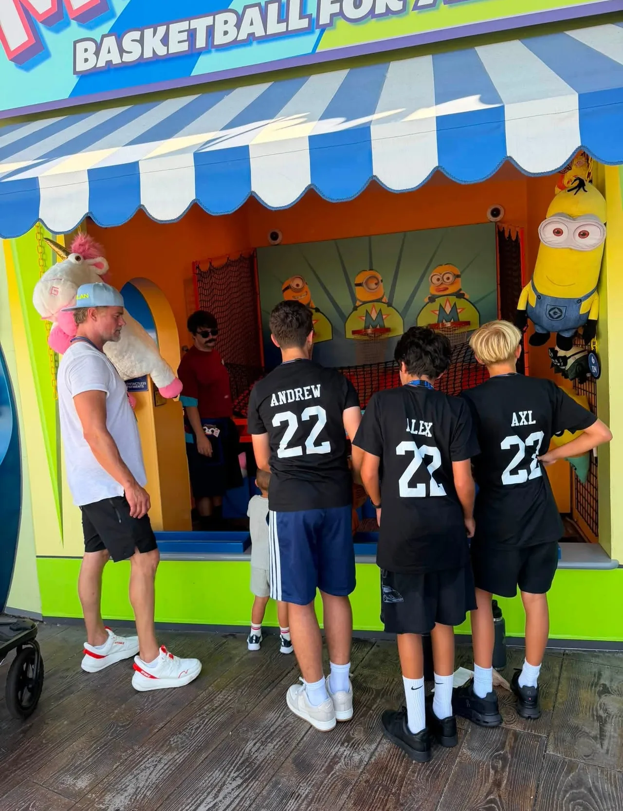 Josh Duhamel looks on as Axl and his friends enjoy a basketball game
