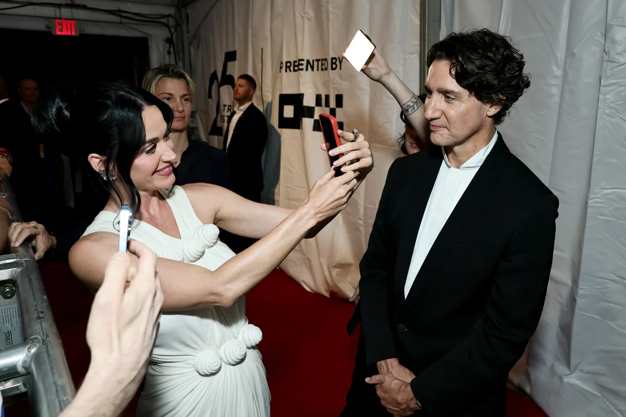 Justin Trudeau steps back to let Katy Perry have her moment at the premiere