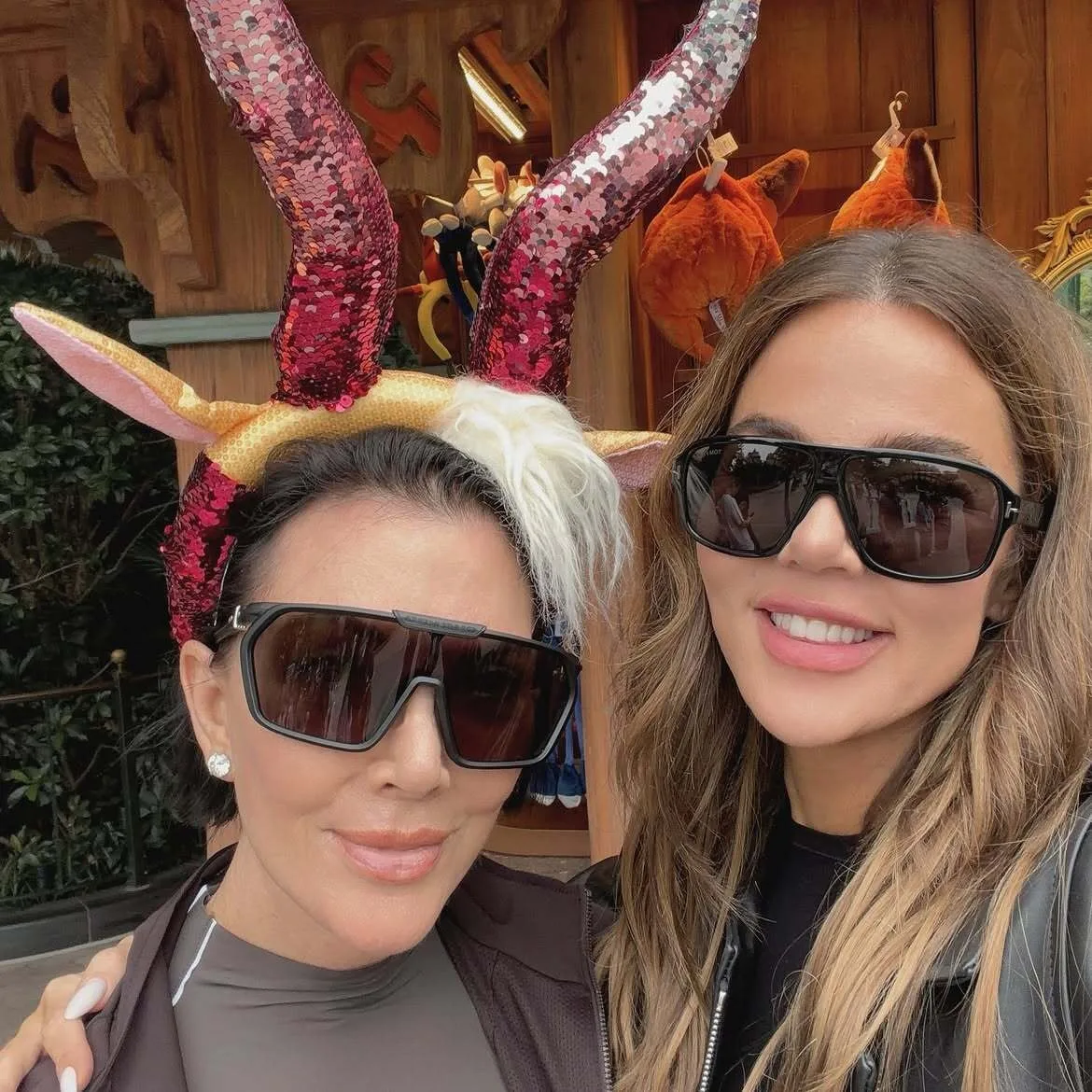 Khloe smiles for selfie with mom Kris