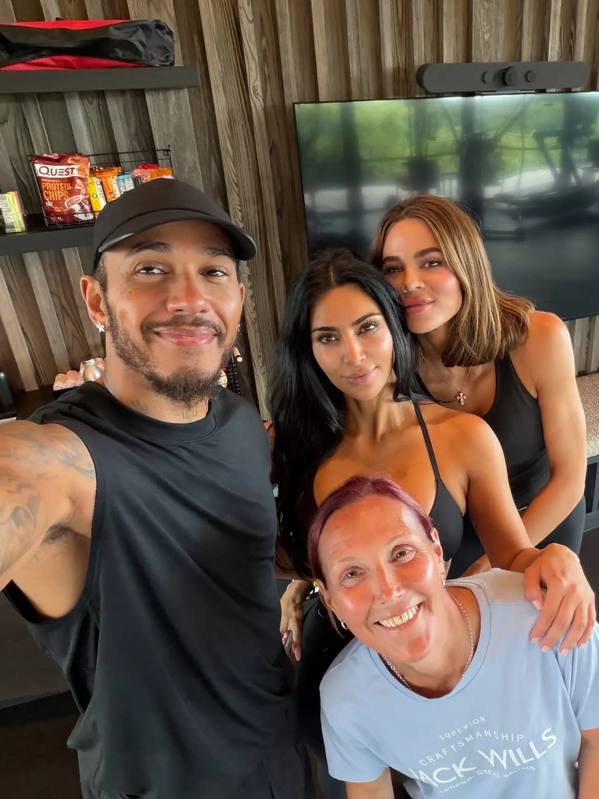 Lewis Hamilton and Kim Kardashian share a selfie with their sisters