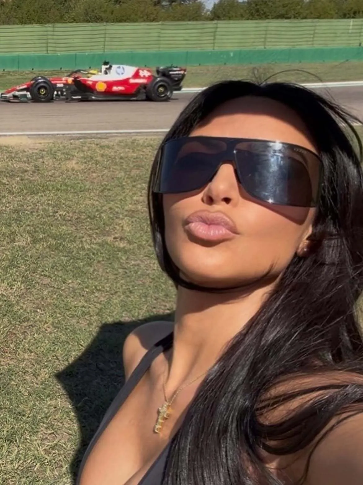 Kim Kardashian shows support as Lewis Hamilton takes the wheel