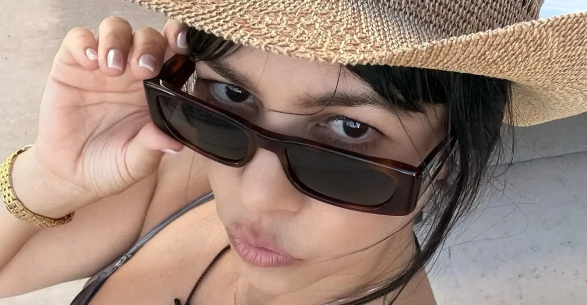 Kourtney Kardashian calls herself 'big family vacation girl'