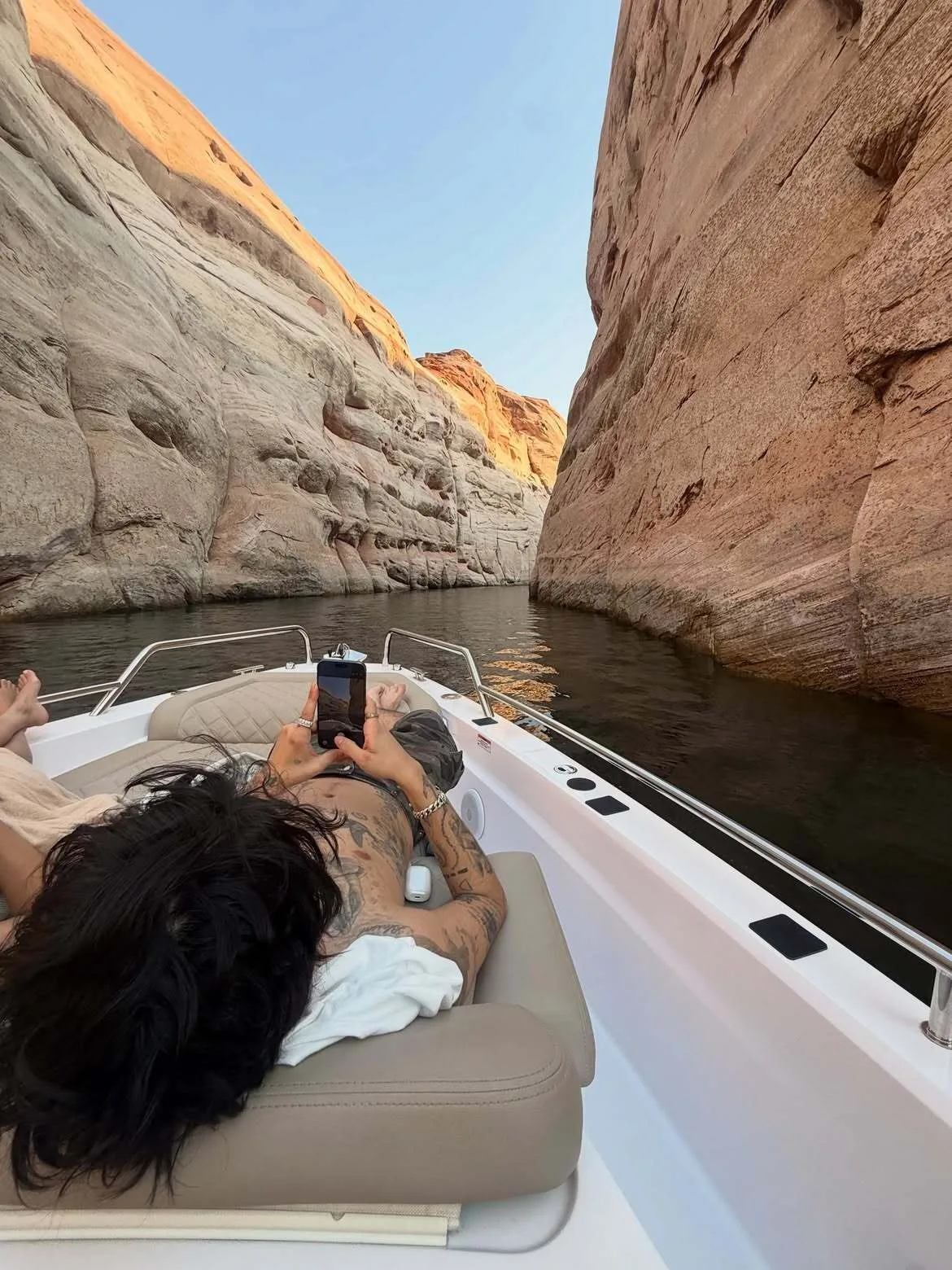 Travis Barker's son Landon Barker relaxes on boat deck