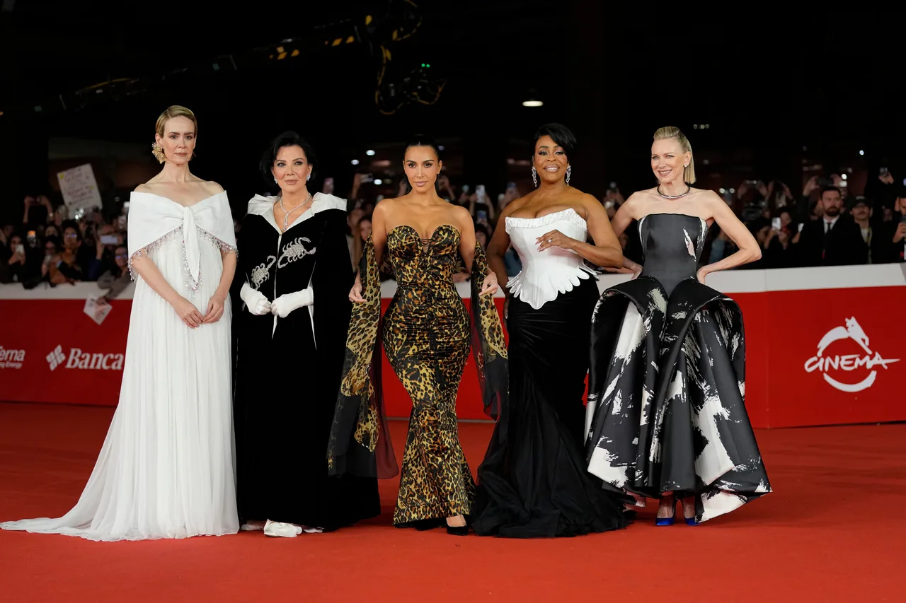 Kris Jenner poses with daughter Kim Kardashian and other stars
