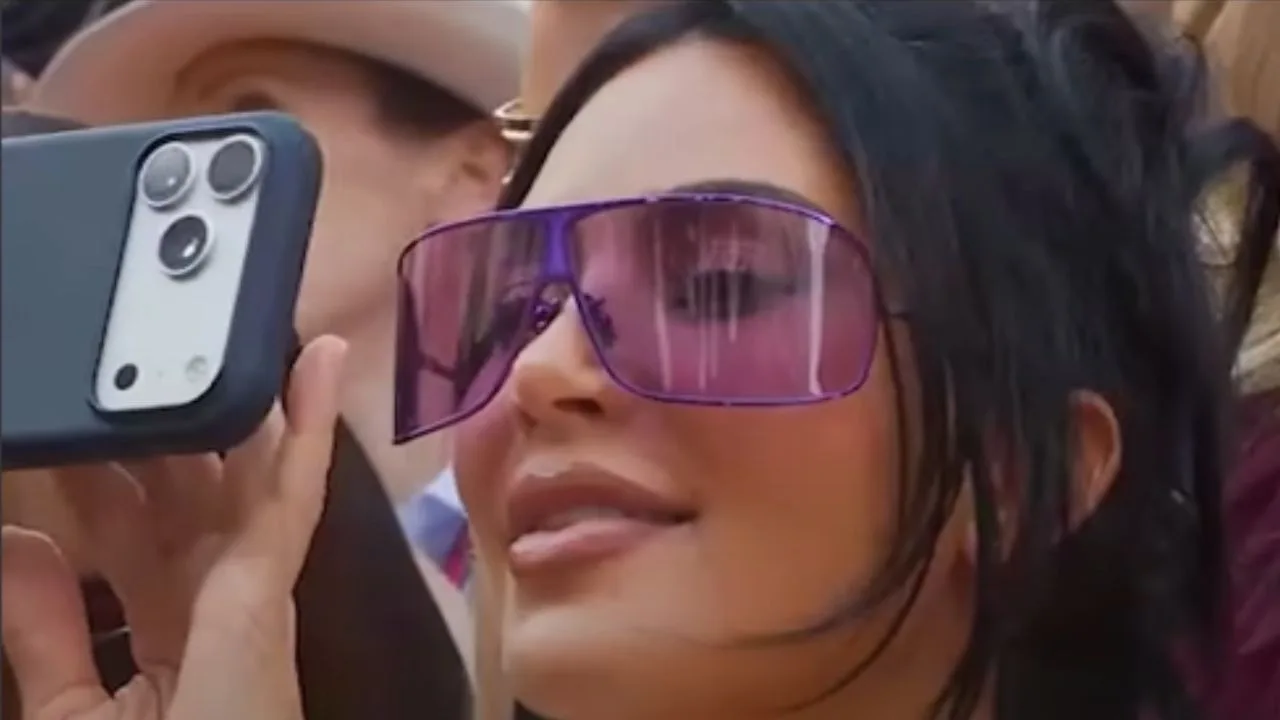 Kim Kardashian caught smiling in response to Lewis Hamilton blowing a kiss