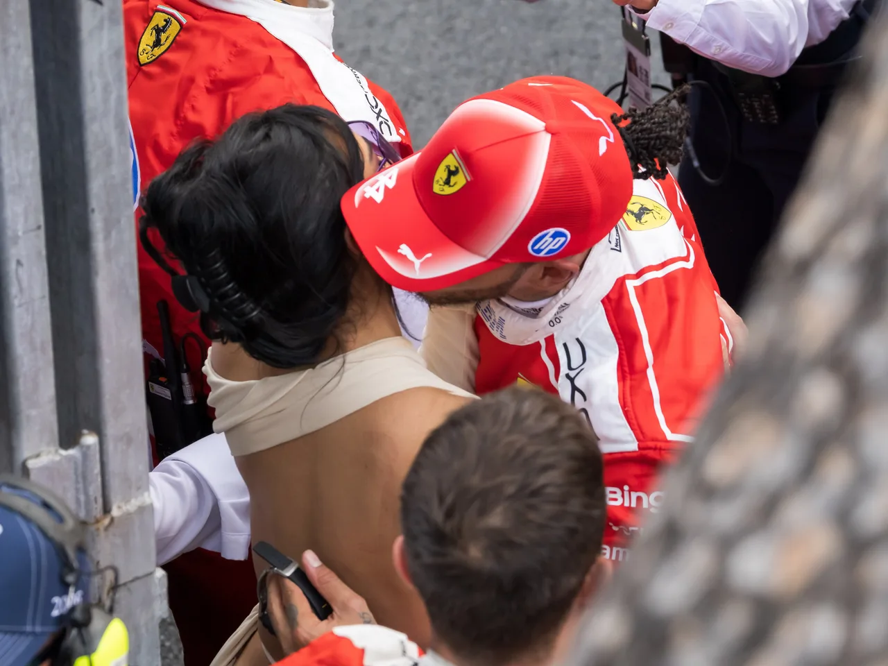 Lewis Hamilton plants a quick kiss on Kim Kardashian's cheek