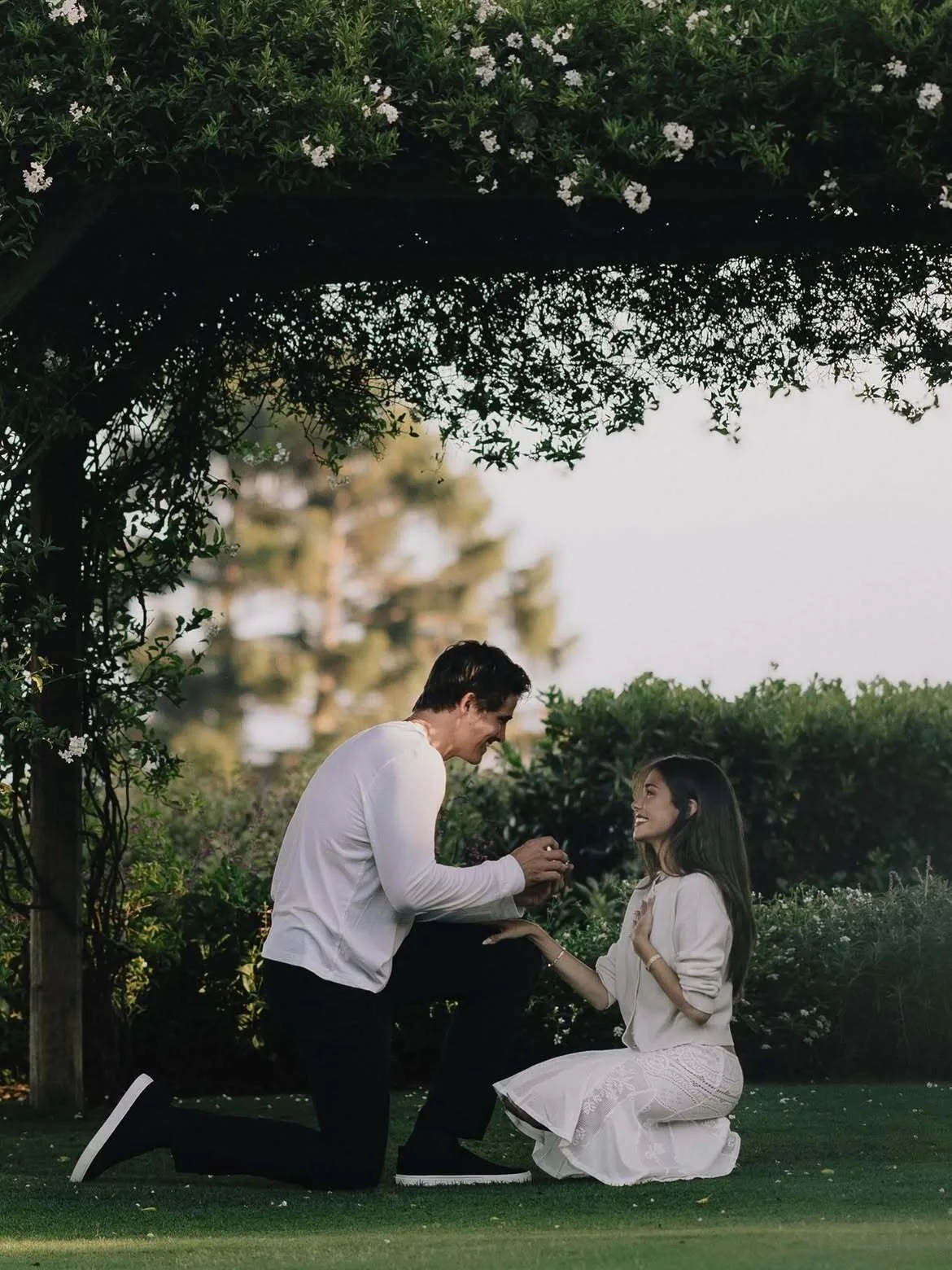 Justin Herbert gets down on one knee to pop the question