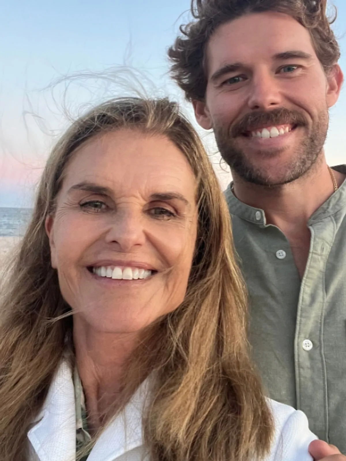 Maria Shriver shares beachside selfie with a grown up Christopher