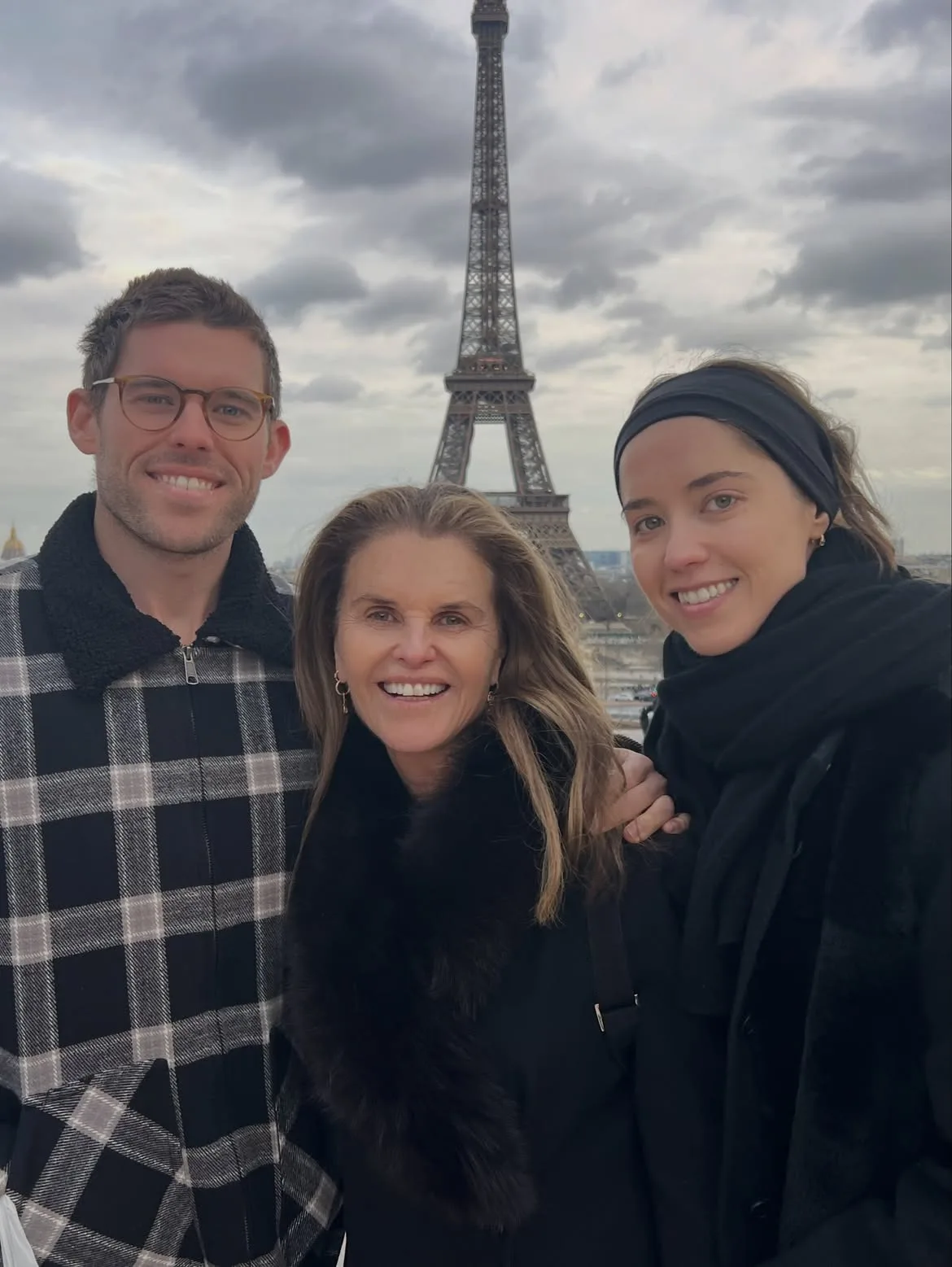 Maria Shriver poses with Christopher and Christina Schwarzenegger in front of the Eiffel Tower