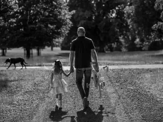 Prince Harry takes a walk with his daughter