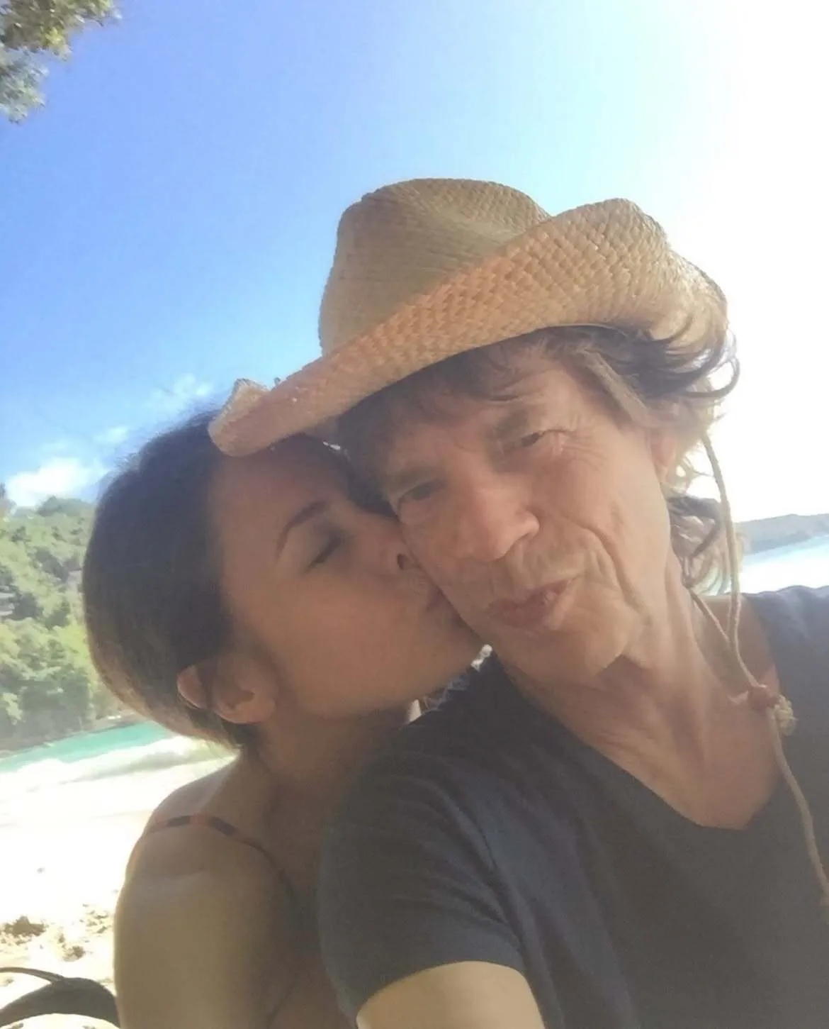 Mick Jagger's fiancée Melanie Hamrick seen stealing a kiss in adorable birthday post