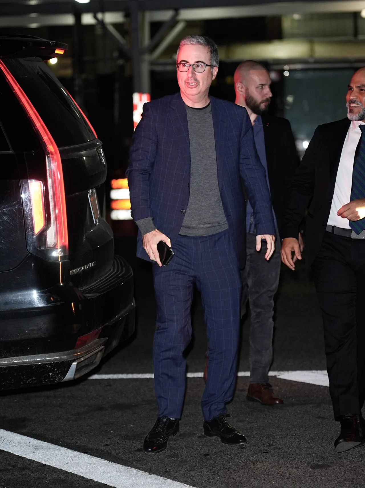John Oliver keeps it sharp in blue-toned classic look