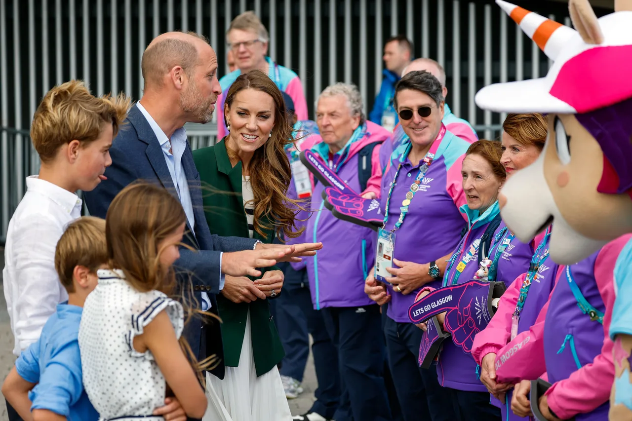 The Wales family interacts with volunteers at Commonwealth Games