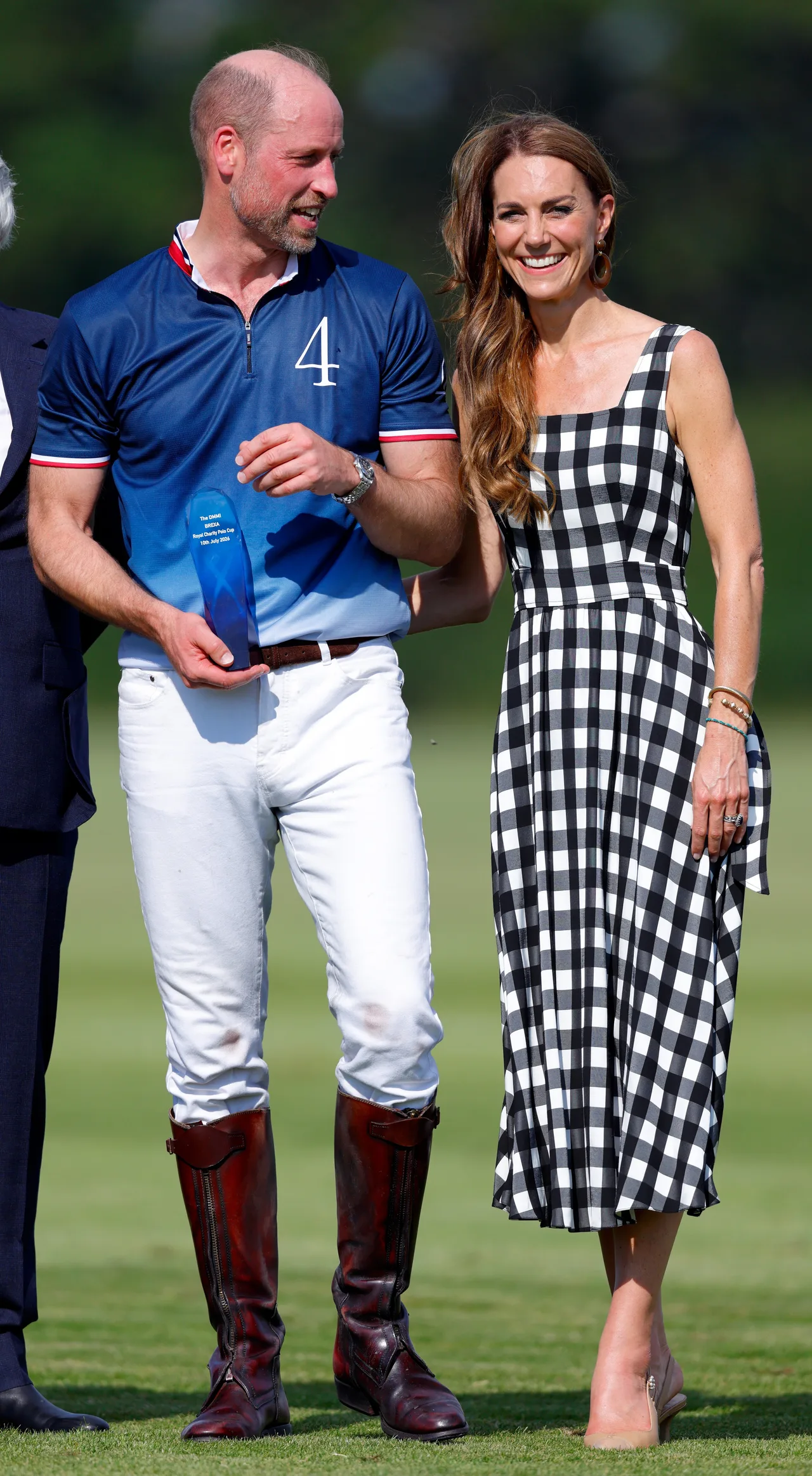 Prince William and Kate Middleton share smiles at Royal Charity Polo Cup