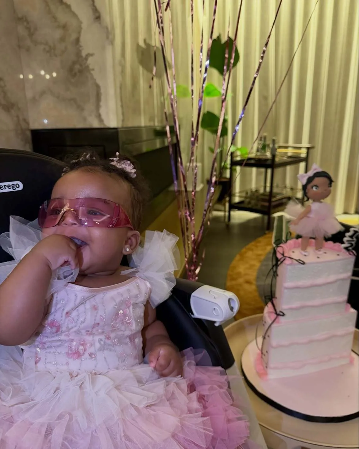 Rocki’s looked pretty in pink for her first birthday party
