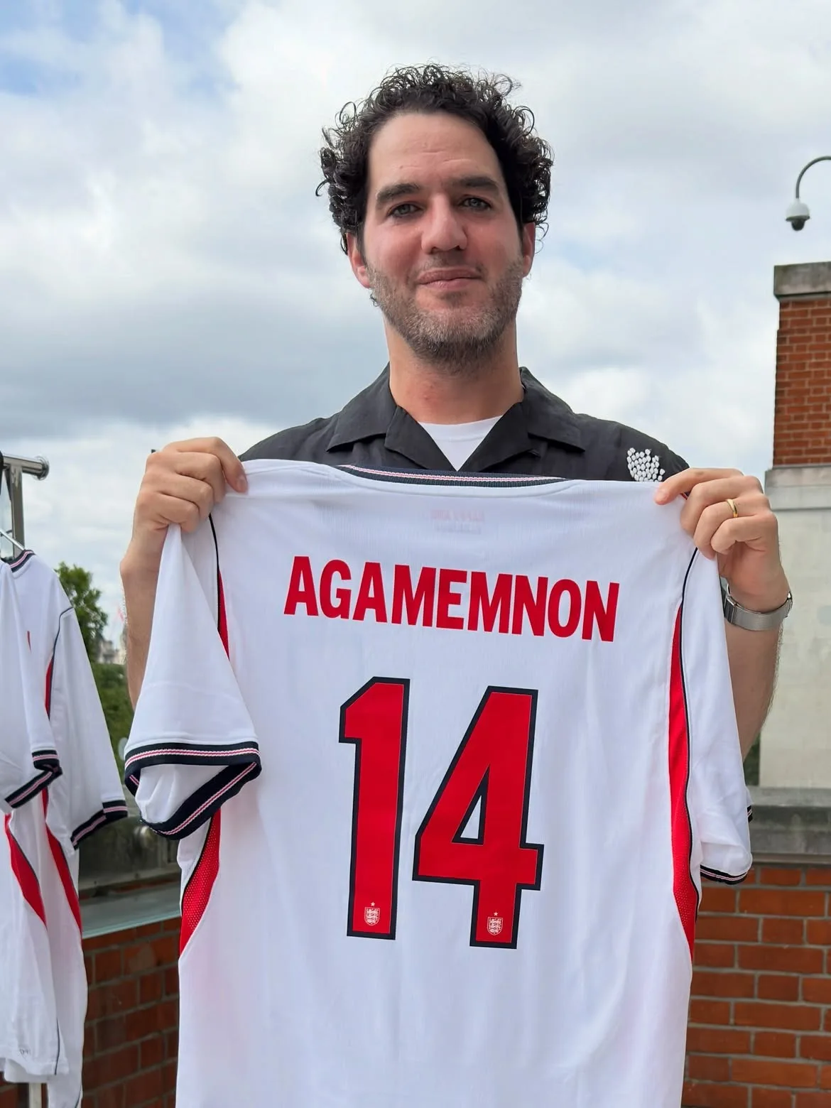 Benny Safdie proudly shows off Agamemnon jersey