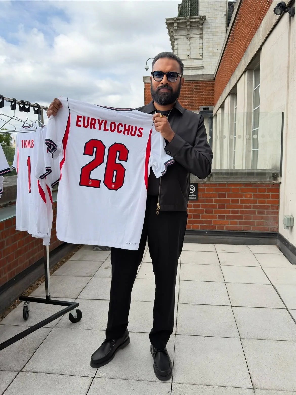 Himesh Patel holds up Eurylochus jersey