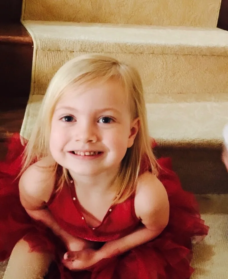 Little Hattie shines bright in a red dress
