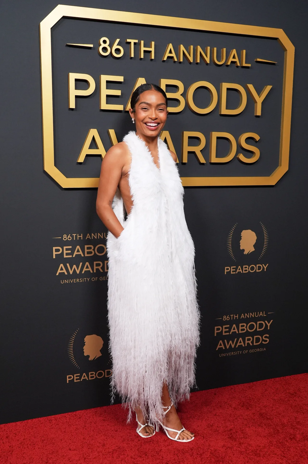 Yara Shahidi stuns in white feather gown